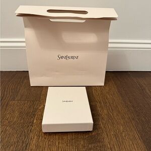 Saint Laurent ivory gift bag and box